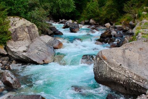 A blue stream between rocks